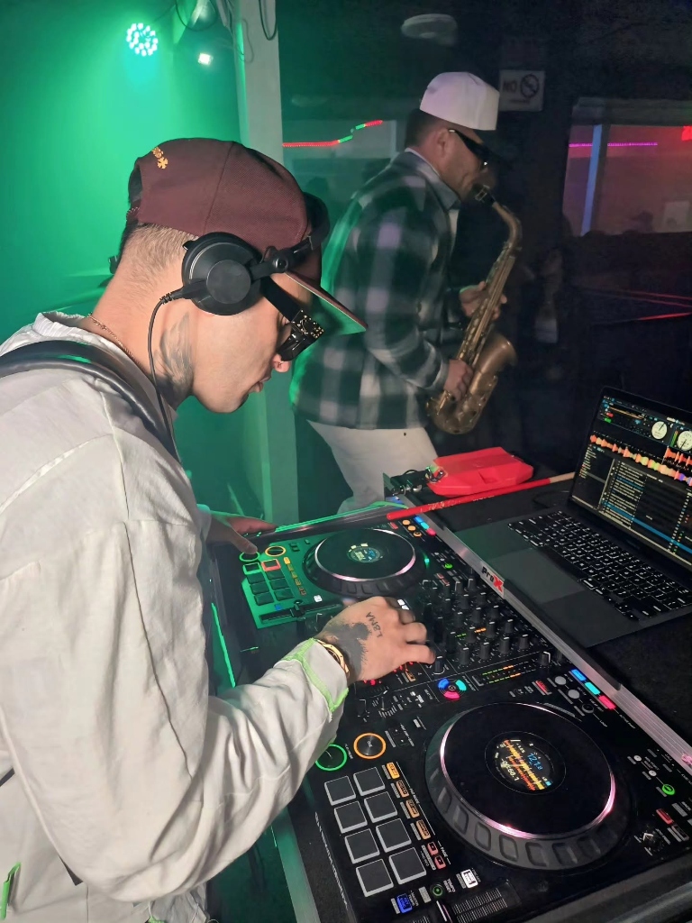 DJ and Live Saxophonist at Mojitos HTX